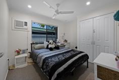 1 Wigham Ct Beaconsfield QLD 4740 $799,000 Get set for a dream summer with this entertainer's paradise. Positioned on a fully fenced 761m² corner block, this supersized single-level home offers three separate living areas, providing the perfect balance of space and comfort for the whole family. The kitchen features a handy servery window that connects seamlessly to the massive alfresco patio, which wraps around two sides of the home and includes a bar-ideal for hosting gatherings or simply relaxing while watching the fun unfold in the stunning inground pool. With five bedrooms and three bathrooms, there's ample space for everyone. The main bedroom enjoys direct access to the pool area and is complete with air-conditioning and a recently renovated ensuite. All additional bedrooms are air-conditioned and fitted with ceiling fans and built-in wardrobes. The versatile tiled rumpus room with an adjoining bathroom presents a fantastic opportunity to use the space as a sixth bedroom, teenager's retreat, or self-contained granny flat. It would also make the perfect area for those who work or study from home. This bright and welcoming home also offers high-clearance covered parking for three vehicles, your boat or caravan, along with a 6m x 4m shed with direct side access. Energy efficiency is well catered for with 10kW of solar panels to help keep running costs low. Seldom do you find family homes of this size that tick all the boxes. Perfect for large or blended families, or those needing extra living quarters for extended family or an Au Pair, this property offers exceptional flexibility. The additional rooms and third bathroom make it ideal for a wide range of buyers. The fantastic outdoor living design creates a wonderful zone for those who love entertaining, and the gorgeous pool will be the place to be this summer. Beaconsfield is praised for its convenient, family-friendly lifestyle. Andergrove Village shops are less than 1.5km away, with Mount Pleasant Shopping Precinct just 4.5km from home. Schools, sporting amenities and parks are also close by, making this an ideal family location.
