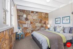 120 Miners Hut Road Chewton Bushlands VIC 3451 $880,000 - $950,000 ENTER VIA SPARKS AVENUE > SPARKS ROAD > MINERS HUT ROAD > WALLABY CRESCENT There's a moment each day when Chewton Bushlands holds its breath. The sun slips low and the sky throws every shade of apricot and mauve across the ridgelines. That's Ukamirra - "sunset" in an Australian Aboriginal language - a fitting name for this stone cottage on a private hilltop, day after golden day. Set on approximately 7 acres of native bushland, on the Melbourne side of Castlemaine (10 mins away), Ukamirra feels like a Swiss alpine refuge reimagined for central Victoria. Hand laid local stone, a giant old oak on the house platform and long views that roll all the way to Mount Macedon and Mount Franklin. Inside, the mood is warm and honest. A comfy lounge anchors the home, with a separate kitchen/dining hub for slow breakfasts and long, chatty dinners. There are 3 bedrooms plus a kids' mezzanine for cubby like dreams and a bright bathroom. Ukamirra runs beautifully off-grid, just as most homes in Chewton Bushlands do. The system is clever, so you can focus on the sunsets, not the switches. The stone keeps things naturally cool in summer with pedestal fans on hand, while winter is well sorted with two wood fires and a hallway gas heater to take the chill off. Why you'll love it: • Hilltop position with panoramic views to Mount Macedon and Mount Franklin • Beautiful local stone cottage with the romance of an alpine lodge and the soul of central Victoria • Giant oak shading the house platform - breakfast, lunch and dinner outdoors • Starry-night BBQs, winter firelight and the daily theatre of sunset that inspired the home's name The details: • Land: approximately 3.07 hectares (approx. 7.5 acres) • Heating/Cooling: 2 Nectre wood fires (lounge and kitchen), hallway gas heater, stone construction that holds summer cool, flyscreens throughout • Power: off-grid system with 4.5 kW Selectronic inverter, 12 x 400Ah batteries, 8 x 200 W solar panels and backup:8 kW diesel generator • Water: approx. 25,000 litre house tank • Carport • Setting: nature reserve along the eastern boundary and a friendly, private neighbourhood Wildlife are your closest neighbours. Expect kangaroos at dawn, a chorus of native birds and the soft hush of the bush. On hot days, pack the swimming noodles and wander down to Golden Point Reservoir - the locals' lake - just 7 minutes away to float with ducklings and reset. Ukamirra is a quiet, creative hideaway with proper views and a deep sense of calm. Come late afternoon, when the light softens and the ridgelines turn violet, you'll understand why the name fits like a glove. This is a home for sunset collectors, stargazers and anyone who believes life is better when it's grounded in nature.