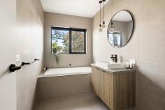 3/8 Cecil Street Frankston VIC 3199 $810,000 - $890,000 Fusing contemporary design with the picturesque beauty of Frankston beachside, this luxurious townhouse embodies a fresh, high-spec take on coastal living in one of the area's most treasured pockets. Owning an off-street position, it weaves natural light across a thoughtful dual-storey layout mere moments from George Pentland Botanic Gardens, University Hospital and Frankston High School. Elevated ceiling heights veil an open-plan ground floor, where spacious living and dining proportions cater to every mode of entertainment. Accompanied by a stone-finished kitchen outfitted with 900mm Baumatic appliances, including a dishwasher, the social hub stretches through a glass slider to reach a secure yard that demands minimal to no maintenance. Bridged to the accommodation by a stunning architectural staircase, three robed bedrooms and two bathrooms sit elevated and totally private. Among them, the master bedroom with mirrored robes, indulges couples with their own private ensuite featuring a dual vanity with underbench storage and oversized shower with rail head and wall niche. Comprehensively upgraded with ducted refrigerated air-conditioning and gas heating, a laundry, powder room, water tank, rear garden shed, and double garage with internal access. Within FHSZ, find Overport Road Primary, Monash University, and Bayside Shopping Centre a short drive from home.