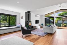 5 Olympic Street Mansfield VIC 3722 $1,000,000 - $1,100,000 Welcome to 5 Olympic Street, a stunning transformation of an original 1980s home - now reimagined into a sun drenched contemporary haven where high end design meets relaxed modern living. Every inch of this property has been thoughtfully renovated to deliver a seamless blend of style, comfort, and functionality, all within easy walking distance to Mansfield's town centre and the golf course. The heart of the home is a captivating open-plan living space, where soaring raked ceilings and expansive, north facing double glazed windows flood the interior with natural light. Engineered timber flooring adds warmth and sophistication, while a central wood burning fireplace creates a cozy focal point - perfect for quiet evenings or entertaining with friends. The sleek, modern kitchen showcases Caesarstone bench tops, induction cooktop, quality cabinetry, soft close drawers, and a cleverly integrated large walk in pantry - ideal for those who love to cook and entertain. Large double glazed sliding doors open onto a superb merbau entertainer's deck, perfectly positioned to overlook the manicured, irrigated gardens. Designed for year-round enjoyment, this outdoor space feels like a natural extension of the living area - a place to unwind, dine, and take in the serenity. Inside, the private retreats include plush, wool blend carpeted bedrooms and beautifully finished bathrooms. The main bathroom exudes luxury, featuring a freestanding bathtub, double vanity, and an oversized glass shower. Thoughtful touches such as skylights in the entry and master ensuite, designer lighting, and streamlined storage elevate this home even further. Features You'll Love: Fully renovated 1980s contemporary home Light-filled open-plan living with raked ceilings and double-glazed windows Double-glazed bedroom windows with contemporary blinds Functional home office space seamlessly integrated into the living area Engineered timber flooring and plush 100% wool carpets Caesarstone kitchen with walk-in butler's pantry and soft-close cabinetry Central wood burning fireplace and skylights in key areas Luxurious bathrooms with freestanding bathtub and double vanity Functional laundry featuring generous storage and a sleek timber look bench top Expansive merbau entertainer's deck overlooking manicured, irrigated gardens 6kW solar system and full ceiling/underfloor insulation for year round comfort Short stroll to Mansfield township and golf course Lock-up garage with drive through access, plus additional parking Small lock up bike shed Concrete ramps at front and back for easy accessibility Every detail speaks to the quality of the renovation - from the craftsmanship to the timeless materials - offering nothing left to do but move in, relax, and embrace a truly contemporary lifestyle in one of Mansfield's most desirable pockets. Step inside, soak up the sun, and make 5 Olympic Street your new retreat!