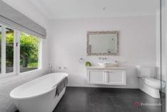17 Moore Park Ln Armidale NSW 2350 Experience the peace and privacy of semi-rural living in this charming family home, beautifully framed by mature elm trees and established gardens. Designed with soaring cathedral ceilings and abundant natural light, it offers a modern yet inviting feel surrounded by nature. Set on three acres of lush greenery, the property provides plenty of space for children to explore — complete with a cubby house, sandpit, chicken coop, and ample room for horses or pets. Inside, you’ll find three generous bedrooms, three bathrooms, and a spacious open-plan living and dining area that opens onto wide verandahs, perfect for entertaining or quiet relaxation. An attached home office or self-contained granny flat connected to the double garage provides the ideal setup for extended family, guests, or additional income — currently returning approximately $2,000 per month as a short-stay rental. Adding to the property’s appeal are two DA-approved blocks of land, offering excellent potential for future development or investment. Positioned on a 1.203-hectare allotment (with subdivision potential, STCA), this rare offering blends the tranquility of country living with convenience — just five minutes from Armidale Airport, local shops, and the New England Regional Art Museum.