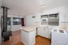 44 Barney Street Armidale NSW 2350 $350,000 - $385,000 Perfectly positioned in the Armidale CBD, 44 Barney Street offers an unbeatable investment opportunity just steps from local conveniences. Within 250 metres, you’ll find a service station, shopping centre, and park — making this one of the most central and accessible locations in town. Inside, the home is warm and inviting: – Cosy living room featuring both wood heating and a cooling fan – Practical kitchen with generous bench space and a handy breakfast bar – Two spacious bedrooms, each with built-in wardrobes – Functional bathroom complete with shower, vanity, and toilet – Separate laundry at the rear, providing easy access to the clothesline Set on a tidy 230m² block, this property combines low-maintenance living with strong rental appeal — a rare find so close to the city centre.