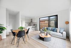 1/3 Lorna Street Seaford VIC 3198 $730,000 - $800,000 Cleverly designed to create a masterful combination of space, light, and detail, this dual-level home boldly delivers a low-maintenance luxury with its recently finished interiors that feature quality finishes, open living areas, and energy-efficient solutions. Employing tasteful contrast and warm timber tones, the first of just three homes introduces its private living spaces with an open-plan social domain featuring space for living and dining alongside a hard-working kitchen featuring modern stainless steel appliances, stone benchtops with a breakfast bar overhang, and functional storage options. A timber staircase unites the four bedrooms and three bathrooms, cascading across both levels to present adaptable living arrangements, with dual master suites each featuring a premium carpet and private ensuite. Accompanied by a ground floor powder room and a double garage with rear laundry facilities, the home includes multiple split-system heating/cooling units throughout, elevated ceiling heights, clothesline, rear garden shed, rain water storage, and a landscaped frontage with secure boundaries. Enjoy total convenience, with close proximity to Seaford Beach, Kananook Train Station, Bayside Shopping Centre, and Peninsula Link access.