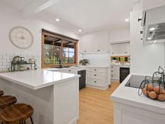 545 Mt Buller Road Mansfield VIC 3722 $1,500,000 - $1,600,000 Positioned just moments from Mansfield township, this exceptional country estate of approximately 13 acres offers a refined blend of rural charm, contemporary comfort and timeless warmth. Framed by rolling lawn, established trees and open paddocks, the property unfolds as a private sanctuary where everyday living feels grounded, spacious, and beautifully composed. Automatic remote-controlled entry gates ensure both privacy and security, immediately setting the tone for the sense of retreat that defines the home. The residence presents with natural timber cladding and deep wrap-around verandahs, creating an inviting yet understated homestead aesthetic. Inside, a thoughtful and elegant renovation brings light, texture and clean architectural lines to the forefront. The bespoke kitchen forms the heart of the home, featuring **stone benchtops, shaker cabinetry, generous wine storage, quality appliances and a double oven-perfect for those who love to cook and entertain. This space connects effortlessly to multiple living and dining zones, ideal for slow Sunday gatherings or hosting with ease. Accommodation is well-zoned for comfort and privacy. The master suite occupies its own peaceful wing, complete with walk-in robe and private ensuite, while secondary bedrooms are generously appointed for family or guests. French doors open directly onto the surrounding decking, where the solar-heated in-ground pool and sun-drenched entertaining terrace overlook the quiet rural landscape-an idyllic backdrop for both seasonal celebrations and everyday unwinding. For equestrian and lifestyle pursuits, the property is exceptionally well appointed. Stables, a dedicated tack room, and a hot horse wash bay cater to horse owners with ease, while a network of fenced paddocks supports grazing or hobby livestock. A year-round dam provides reliable water supply, with pumping infrastructure available to service the house and garden if desired. A seasonal creek meanders softly through the land, adding natural rhythm, texture and beauty. A substantial 9m x 24m powered shed offers outstanding capacity for vehicles, machinery, trade equipment or studio use, while an additional older shed / garage provides further storage, workshop space or potential adaptation. Features at a Glance - 12.8 acres of gently undulating, highly usable land - Automatic remote controlled entry gates providing security & privacy - Beautifully renovated country homestead with refined, neutral interior palette - Bespoke kitchen with stone benchtops, shaker cabinetry, double oven, breakfast bar & wine storage - Light-filled living & dining zones with garden and paddock outlooks - Master suite with walk-in robe & private ensuite - Three additional bedrooms with built-in robes - Loft / retreat ideal for office, studio or guest accommodation - Split system heating & cooling plus wood fire for year-round comfort - Wrap-around verandahs for shaded outdoor living - Solar-heated in-ground swimming pool with decked surrounds & entertaining terrace - Fire pit area for star-filled evenings - Views toward Mt Buller, shifting with the seasons - Stables, tack room & hot horse wash bay - Fenced paddocks designed for horses or livestock - Year-round dam with pump capability to house/gardens - Seasonal creek meandering through the property - Chook pen & scope for vegetable gardens, orchard or hobby grazing - Substantial 9m x 24m powered shed plus additional older shed/garage - Ample water storage and reliable access - Positioned along Mt Buller Road, just 5 minutes to Mansfield - Close to cafés, schools, supermarkets, Lake Eildon & Mt Buller This is refined country living-serene, sophisticated and deeply connected to the land, yet moments from township convenience and alpine adventure.