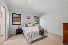 5 Olympic Street Mansfield VIC 3722 $1,000,000 - $1,100,000 Welcome to 5 Olympic Street, a stunning transformation of an original 1980s home - now reimagined into a sun drenched contemporary haven where high end design meets relaxed modern living. Every inch of this property has been thoughtfully renovated to deliver a seamless blend of style, comfort, and functionality, all within easy walking distance to Mansfield's town centre and the golf course. The heart of the home is a captivating open-plan living space, where soaring raked ceilings and expansive, north facing double glazed windows flood the interior with natural light. Engineered timber flooring adds warmth and sophistication, while a central wood burning fireplace creates a cozy focal point - perfect for quiet evenings or entertaining with friends. The sleek, modern kitchen showcases Caesarstone bench tops, induction cooktop, quality cabinetry, soft close drawers, and a cleverly integrated large walk in pantry - ideal for those who love to cook and entertain. Large double glazed sliding doors open onto a superb merbau entertainer's deck, perfectly positioned to overlook the manicured, irrigated gardens. Designed for year-round enjoyment, this outdoor space feels like a natural extension of the living area - a place to unwind, dine, and take in the serenity. Inside, the private retreats include plush, wool blend carpeted bedrooms and beautifully finished bathrooms. The main bathroom exudes luxury, featuring a freestanding bathtub, double vanity, and an oversized glass shower. Thoughtful touches such as skylights in the entry and master ensuite, designer lighting, and streamlined storage elevate this home even further. Features You'll Love: Fully renovated 1980s contemporary home Light-filled open-plan living with raked ceilings and double-glazed windows Double-glazed bedroom windows with contemporary blinds Functional home office space seamlessly integrated into the living area Engineered timber flooring and plush 100% wool carpets Caesarstone kitchen with walk-in butler's pantry and soft-close cabinetry Central wood burning fireplace and skylights in key areas Luxurious bathrooms with freestanding bathtub and double vanity Functional laundry featuring generous storage and a sleek timber look bench top Expansive merbau entertainer's deck overlooking manicured, irrigated gardens 6kW solar system and full ceiling/underfloor insulation for year round comfort Short stroll to Mansfield township and golf course Lock-up garage with drive through access, plus additional parking Small lock up bike shed Concrete ramps at front and back for easy accessibility Every detail speaks to the quality of the renovation - from the craftsmanship to the timeless materials - offering nothing left to do but move in, relax, and embrace a truly contemporary lifestyle in one of Mansfield's most desirable pockets. Step inside, soak up the sun, and make 5 Olympic Street your new retreat!