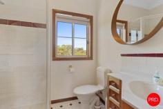 142 Richards Road Castlemaine VIC 3450 $1,250,000 - $1,350,000 If your dream brief reads kids upstairs, parents' retreat, pets, pony and pizza nights under the stars, this one ticks the lot. Set privately across approx. 2.5 acres of park like grounds with access to town water, this 5 bedroom double storey home is made for hide-and-seek and Sunday cricket. Inside, every window frames the garden like living art. A formal entry leads to a generous lounge with a bay window and sliding doors to a sunny north facing courtyard. A light filled north facing sunroom is your quiet corner for books, jigsaw puzzles and winter sunshine. The dining room opens to a supersized 13m x 7.4m alfresco - think long tables, fairy lights and an outdoor kitchen ready to go with hot and cold water already plumbed. The kitchen is family ready with a Smeg 900 mm freestanding oven, 2 drawer dishwasher, plumbed fridge, walk-in pantry and wrap around bench for homework and taste testing. A powder room, walk-in linen, full laundry and a flexible fifth bedroom or home office with its own entrance complete the ground floor - ideal for multi-generational living or private consults. Upstairs, a central sitting area looks over the gardens. The main bedroom features a walk-in robe and ensuite. 3 more bedrooms each have walk-in robes and leafy views, while the family bathroom brings a spa bath, shower, vanity and a separate toilet. Comfort is covered with evaporative cooling, ground-floor in-slab heating, split systems, ceiling fans and a handy laundry chute. Outside is where the magic happens. A circular drive sweeps to a 6m x 6m double garage with direct alfresco access for easy unloads. The rear garden blends into a whimsical "secret garden" of perennials, plus a fire pit zone for marshmallows and stargazing. Kids can race the dog across lush lawns before heading to the paddock - protected by kangaroo and rabbit-proof fencing. For tinkerers and toy-collectors, there's serious shedding: a 9m x 13.5m garage/workshop for the car enthusiast, a 6m x 9m machinery shed, plus side driveway access with a secure gate and room for the caravan, boat or horse float. The approx. 1 acre fenced paddock with established gums and chicken pen invites ponies, alpacas or a hobby farm chapter. On Richards Road you'll also find the Castlemaine Pony Club and there's easy access to Walmer Forest Reserve with around 60 km of singletrack for riding and adventure. All of this is less than 2 minutes from Castlemaine's cafes, schools, station and the Botanical Gardens when you need to reconnect. Grand living with heart - this is a home that feels like the beginning of a very good story