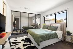 3/8 Cecil Street Frankston VIC 3199 $810,000 - $890,000 Fusing contemporary design with the picturesque beauty of Frankston beachside, this luxurious townhouse embodies a fresh, high-spec take on coastal living in one of the area's most treasured pockets. Owning an off-street position, it weaves natural light across a thoughtful dual-storey layout mere moments from George Pentland Botanic Gardens, University Hospital and Frankston High School. Elevated ceiling heights veil an open-plan ground floor, where spacious living and dining proportions cater to every mode of entertainment. Accompanied by a stone-finished kitchen outfitted with 900mm Baumatic appliances, including a dishwasher, the social hub stretches through a glass slider to reach a secure yard that demands minimal to no maintenance. Bridged to the accommodation by a stunning architectural staircase, three robed bedrooms and two bathrooms sit elevated and totally private. Among them, the master bedroom with mirrored robes, indulges couples with their own private ensuite featuring a dual vanity with underbench storage and oversized shower with rail head and wall niche. Comprehensively upgraded with ducted refrigerated air-conditioning and gas heating, a laundry, powder room, water tank, rear garden shed, and double garage with internal access. Within FHSZ, find Overport Road Primary, Monash University, and Bayside Shopping Centre a short drive from home.