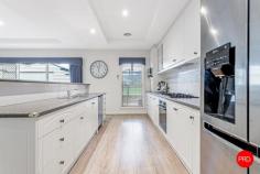 5744 Calder Highway Kangaroo Flat VIC 3555 $675,000 - $735,000 Set on a generous allotment in the heart of Kangaroo Flat, this immaculately presented residence blends family functionality with modern comfort. Offering multiple living areas, four spacious bedrooms, and a fantastic outdoor set-up, it's an ideal home for families who value both space and convenience. Stepping inside, a welcoming foyer leads through to a light-filled family lounge that sets the tone for relaxed living. The open-plan kitchen, living, and dining area is designed for entertaining, with a large island bench, ample storage, quality stainless steel appliances, and an adjoining pantry. Generous proportions allow the dining zone to easily accommodate a full-sized table, creating the perfect hub for family gatherings. Accommodation includes four well-sized bedrooms, each with built-in storage. The master suite offers a walk-in robe and private ensuite, while the additional bedrooms share a central family bathroom with separate toilet. The layout ensures comfort and privacy for every member of the household. Outdoors, the property is equally impressive. A fully secure backyard provides a safe environment for children and pets, complete with landscaped gardens, play areas, and a generous paved entertaining patio. The wide driveway leads to a large double garage with extra storage space, ideal for trades, hobbyists, or additional vehicles. With ducted heating and cooling throughout, the home delivers year-round comfort. Positioned close to Kangaroo Flat's shopping precinct, schools, sporting facilities, and transport links, it offers both lifestyle convenience and long-term appeal. Key Features: • Four spacious bedrooms including private master suite • Multiple living areas plus open-plan kitchen & dining • Large shed/garage with excellent storage & workshop space • Secure backyard with play areas & alfresco entertaining