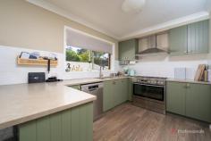 14B Ash Tree Drive Armidale NSW 2350 $625,000 - $675,000 Positioned in a peaceful and sought-after pocket of Armidale, 14B Ash Tree Drive delivers modern comfort and functionality across two well-designed levels. Built from solid brick, this spacious townhouse combines low-maintenance living with a quiet neighbourhood setting. The open-plan living and dining area flows effortlessly to a covered deck downstairs, creating an inviting space to entertain or unwind. Upstairs, a second deck offers a private spot to enjoy the fresh air and outlook. The kitchen is smartly laid out and connects seamlessly to the main living zone, making everyday life easy and practical. Accommodation includes four bedrooms in total — three upstairs with built-in wardrobes, and one conveniently located downstairs, ideal for guests or flexible use as a home office. The main bedroom features an ensuite, while the second bathroom services the remainder of the home. A dedicated storage room adds valuable functionality and convenience. Set in a quiet, established area close to schools, shops, and parks, this property represents an excellent opportunity for families, first home buyers, or investors seeking a solid, low-maintenance Armidale home.