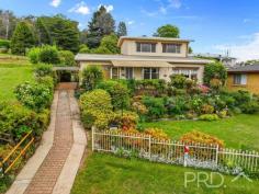 42 Batlow Road Batlow NSW 2730 $450,000 Positioned on the high side of the street and offering a diverse internal floor plan, you will love the size, outlook and potential of this three bedroom home set amongst manicured grounds. Offering three great sized bedrooms, great size living area with additional second living or rumpus upstairs and multiple outdoor entertaining options. Do not miss your opportunity to secure this versatile family home in the picturesque township of Batlow! Premiere Features: - Three great sized bedrooms, two boasting ducted reverse cycle - Centrally located bathroom with shower, toilet and single vanity - Kitchen positioned to the rear of the home with electric cooktop and great storage options - Dining positioned directly off the kitchen and direct external access to the rear - Great size living area with ducted reverse cycle and positioned to the front of the plan to take in the views of the surrounding mountains - Good size external laundry, with separate toilet - Additional linen in hall - Upstairs rumpus area or second living, boasting an elevated aspect with beautiful views - Tiled rear entertaining area, fully covered with lighting and power - Covered front deck upon entry - Single carport - Fully landscaped front and year yard - Additional alfresco area in the rear yard - Gazebo positioned in the centre of the rear yard - Garden shed - Rainwater tank - Approximate 948m² allotment This versatile family home with manicured grounds and picturesque views of the surrounding mountains is an opportunity not to be missed.
