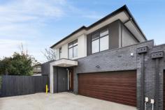5/39 Simpsons Road Box Hill VIC 3128 Perfectly positioned within easy reach of Box Hill High School and Kerrimuir Primary, this contemporary two-storey townhouse delivers the ideal combination of modern style, everyday comfort and unrivalled convenience. Step inside to discover a light-filled open-plan living and dining zone designed for effortless entertaining and relaxed family living. Flowing seamlessly to a private courtyard, this inviting space is perfect for weekend gatherings or quiet moments outdoors. The sleek, designer kitchen takes centre stage, featuring stone benchtops, quality stainless-steel appliances and abundant storage. Upstairs, the spacious master suite complete with ensuite provides a peaceful retreat, while two additional bedrooms with built-in robes are serviced by a stylish central bathroom. For ultimate flexibility, a second master bedroom with ensuite is conveniently located on the ground floor-ideal for guests or multi-generational living. Further features include beautiful timber flooring, split-system heating and cooling throughout, a practical laundry, and a secure double garage with internal access for everyday ease. Located just minutes from Box Hill Central's bustling shopping, dining and transport hub, and surrounded by sought-after schools, parks and amenities, this exceptional residence offers an unbeatable lifestyle opportunity in one of Melbourne's most desirable pockets. Whether you're upsizing, downsizing or investing, this standout townhouse promises modern living at its very best.