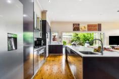 24 Lawrence Street Blackheath NSW 2785 $1,350,000 - $1,485,000 Occupying an elevated position, with a nor-easterly perspective, in one of Blackheath's tightly held and whisper-quiet streets, this beautiful 1930s character home boasts privacy, space, gentle renovation and exciting further potential. There are two separate titles, and with each block being approximately 695sqm, there is scope to introduce a second dwelling (STCA) if desired. With retained period features, the high ceilings, wraparound verandah, wood floors and timber panelling arrest attention on arrival. With thoughtful renovations throughout, the home offers versatile and functional living spaces, whilst still retaining timeless mountain charm. This address offers peace, space and polished comfort in a location connected to nearby bushwalking trails, village amenities and city transport links. This three bedroom, two bathroom beauty is truly out-of-the ordinary and boasts excellent indoor/outdoor connections from multiple angles. Life here has the potential to offer relaxed, meditative mornings and exciting social gatherings taking advantage of the various gardens 'rooms'. This is the perfect example of getting the balance right for those seeking the revered mountain lifestyle. Breakdown of Features: Retained 1930s period high ceilings; wood floorboards; timber panelling Beautifully light-filled open plan living/dining/kitchen with island bench Slow combustion wood burner in living area; ducted gas heating throughout Multiple indoor/outdoor transitions; multiple spaces for alfresco entertaining Three bedrooms; master retreat with shower ensuite and scope to remodel Luxury bathroom with spa-like feel, huge walk-in shower and deep bath Separate powder room WC; large internal laundry; additional store cupboard Single lock-up garage; established garden 'rooms' offering peaceful privacy Approx 1.4km 20 min stroll or 4 min easy drive to all village amenities