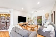 50 Danalene Parade Corlette NSW 2315 Nestled in an exclusive and tightly held enclave of Corlette, this exceptional residence embodies sophisticated coastal luxury just 100m to the waters edge and 500m from the sparkling waters of Roy Wood Reserve Beach. Backing directly onto peaceful reserve land and capturing blue vistas from multiple areas of the home, it offers an unparalleled lifestyle opportunity for those seeking elegance, space and a truly premium coastal address. Bathed in natural light and designed to celebrate its breathtaking surrounds, the home's bright interior showcases large picture windows framing sparkling water views and lush green outlooks. A refined coastal-inspired colour palette, quality finishes and a seamless indoor-outdoor flow elevate the home into a warm and inviting sanctuary. The main residence features a contemporary open-plan kitchen, living and dining space, perfectly positioned to overlook the water. The expansive kitchen is a statement in itself, complete with a generous island bar and elevated sea views-an ideal setting for effortless family living and stylish entertaining. A second family room provides additional flexibility, offering a quiet retreat and an ideal spot for relaxation or separate entertaining away from the main living zones. A true highlight of the home is the expansive outdoor entertaining areas. The main elevated deck is framed by low maintenance manicured gardens and tropical palms, overlooking lush reserve greenery and capturing beautiful vistas and magical sunsets. To the rear, a second covered deck creates an additional alfresco and BBQ area, ideal for year-round entertaining in a more private setting. Accommodation throughout the home is exceptional. All five bedrooms are generously sized and fitted with built-in wardrobes, while the luxurious master suite enjoys commanding water views and a private ensuite, delivering a resort-like experience. Adding significant versatility and appeal, the fully self-contained unit offers income potential through short- or long-term leasing, or an ideal solution for multigenerational living, guests or independent family members. Practicality meets lifestyle with an extra-large double garage featuring built-in storage cabinets and workbenches, complemented by ample additional off-street parking for cars, boats or visitors. The home is further enhanced by an impressive 28 solar panels paired with a 10.5kW inverter, providing excellent energy efficiency and reduced running costs. Additional features include a dedicated office with separate entry and bathroom, plantation shutters, air conditioning, and ceiling fans throughout. A short 320m tree lined walk will see you on the white sands of Corlette Beach and at the door step of the world-class Anchorage Marina, the residence offers enviable proximity to beachside strolls, boating, waterfront dining and the serenity of nature right at your back door. This is more than a home-it is a prestigious coastal haven in an elite location, offering a rare combination of water views, versatility, natural beauty and timeless appeal. A remarkable opportunity to secure a truly unique residence in one of Corlette's most desirable settings.