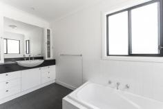 20 Sugarwood Place Farmborough Heights NSW 2526 Filled with natural light and thoughtfully designed spaces, this four bedroom two bathroom home offers comfortable modern living with an oversize master that includes a walk in robe and ensuite. The kitchen and main living zones are positioned downstairs to create an easy everyday flow, while all bedrooms are privately placed upstairs. It is a home that suits families who want space to enjoy time together and still stay connected to parklands, transport and the nearby town centre. Property Highlights: Spacious lounge and dining areas that enjoy all day sun Feature ceilings, wood fire and split system air conditioning Covered deck with roll down blinds for year round entertaining Elevated north east aspect offering leafy district views and ocean glimpses Stone topped kitchen island, dishwasher and generous storage Main bedroom with spa ensuite and a private deck Ceiling fans and solar power Ducted Air conditioning and combustion fire place Low maintenance level yard Double carport with additional parking for several cars Quiet cul-de-sac position with private road access Location Highlights: Wollongong CBD only a short fifteen minute drive away Beaches within easy reach for weekend outings Convenient access to public transport for travel to Wollongong University Close to schools shops and everyday conveniences