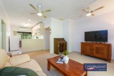 3 Tee Ave Mundaring WA 6073 $850,000 A rare chance to claim almost an acre of established gardens in the heart of Mundaring village, where towering gums and mature plantings create a private world just moments from cafes, shops and schools. 3 beds 1 bath 2 WCs 1994 cedar and iron Airy open floor plan Formal dining room OP kitchen lounge Wrap deck verandah Big under croft space Scheme water & retic 3693 sqm hidden lot Magic in Mundaring The sense of arrival here is immediate. A long driveway moves through layered gardens before delivering you to a cedar home that seems to float among the trees. This is proper privacy – the kind that makes you forget the village centre is just a five-minute walk away. You could be deep in the hills, yet the bakery, supermarkets and coffee are all within easy reach. The home presents a straightforward floor plan that works well for daily life. A central hallway provides clear separation between living spaces and the bedroom wing, with the formal dining room occupying an elevated corner position that places you in the canopy. Morning light filters through established trees, and the room feels more treehouse than traditional dining space. The kitchen is practical rather than showy, fitted with a freestanding oven, dishwasher and a servery window that maintains connection to the dining room. From the carpeted lounge room, a sliding door opens to the front deck – a generous space that becomes an extension of the living area in the warmer months. The reverse-cycle air conditioning handles summer heat, while the mature trees provide natural cooling and the dappled shade that makes outdoor living enticing. The bedroom wing is sensibly arranged. Two bedrooms share the family bathroom, with the current principal bedroom benefiting from split system air conditioning and a ceiling fan. The adjoining powder room can also be accessed via the deck, a detail that proves its worth when you’re entertaining or working in the garden. The first bedroom connects to a spacious storeroom with a dropped floor – a ready-made opportunity for conversion to a second bathroom if that suits your needs. A walk-through laundry with a separate toilet completes this section of the home, and those two double linen presses in the hallway solve the eternal storage question. But step outside, and the real story unfolds. Almost 3,700 square metres of gardens wrap around the house in layers – a mix of native eucalypts, established exotics, fruit trees and the remnants of structured garden beds. The bones are excellent. This was clearly a considered landscape in its day, and while it needs attention now, the framework remains. You can see the potential garden rooms, imagine the restored vegetable beds, picture the fruit trees producing again. The reticulation system is already in place for sections of the garden, and scheme water is connected. This is the kind of property where children create elaborate games among the trees, where you spend weekends gradually bringing order to the wilder sections, and where the undercover area beneath the house suggests possibilities for a workshop or studio space. Friends arrive for lunch and stay until evening, drawn by the atmosphere of seclusion and the novelty of finding such expansive grounds so close to everything. The location delivers genuine convenience – walking distance to the village means less time in the car and more time at home. Mundaring Primary School sits nearby, with Parkerville Steiner schools or Helena College for secondary education. Midland is a 20-minute drive for major shopping and services, the airport is 35 minutes away, and Perth CBD is accessible in around 45 minutes. Yet the property feels entirely removed from the chaos of suburbia.
