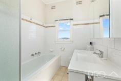 4 Mountain Avenue Batlow NSW 2730 $369,000 Positioned with an elevated aspect and boasting picturesque views, this solid home offers three bedrooms, large sun filtered living area with wood fire heating and split system air conditioning, great size kitchen and additional sunroom to the rear of the plan, all designed to capture the picturesque surrounds. You will love the space afforded in this three-bedroom brick home with low maintenance grounds on the aptly named Mountain Avenue. Do not miss your opportunity to secure such a solid home in the heart of the picturesque township of Batlow. Call or email today to book your inspection! Premiere Features: - Three bedrooms, two with ceiling fans - Bathroom with separate shower, separate bath, single vanity, wall mounted shaving cabinet and toilet - Large sun filtered lounge upon entry boasting wood fire heating, split system air conditioning and ceiling fan - Great size kitchen with slow combustion stove, electric cooktop, good bench space and cabinetry with an elevated aspect - Sunroom or dining with tiled flooring and a great view of the surrounding countryside - Mudroom area to the rear with a second separate toilet - Downstairs laundry - Front alfresco area - Single lock up garage with lighting and power - Additional woodshed - Good size fully fenced rear year with vehicle access - Approximate 841m² low maintenance allotment - Under house secure storage - Sash windows throughout