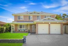 13 Durali Road Glenmore Park NSW 2745 $1,450,000 Move In, Show Off Welcome to 13 Durali Road, a spacious family haven designed for modern living, working and entertaining. This beautifully planned home offers multiple living zones including a large front lounge, open dining area and a central kitchen that connects seamlessly to the alfresco, while a second lounge complete with a built-in bar creates the perfect retreat for relaxed evenings or entertaining guests. A dedicated office at the front of the home provides the ideal work-from-home setup, and sliding doors open to a generous alfresco and additional rear patio, giving you exceptional indoor-outdoor living all year round. Upstairs, four well-sized bedrooms offer comfort for the entire family, with built-in robes to all and a private master suite featuring a walk-in robe and ensuite. With a double garage, excellent storage, functional design and plenty of room to grow, this is the complete family package in a highly sought-after Glenmore location; a home that delivers space, lifestyle and effortless comfort from the moment you arrive. FEATURES WE LOVE; • 4 spacious bedrooms including a master suite and sleek ensuite • 3 separate living areas ideal for families, entertaining & working from home • Designer kitchen with premium stone benches, appliances & ample storage • Modern bathrooms with high-end, luxe finishes • Dedicated bar/entertaining room with exposed brick feature bar, built with purpose • Split system air-conditioning throughout for year-round comfort • Double garage with fresh epoxy flooring • Immaculately maintained inside & out - simply move in and enjoy, perfect for entertaining or enjoying • Prime location close to local schools, shops, parks and amenities This home is the complete family package; one you will want to show off and brag about. The kind of home buyers walk into and instantly fall in love with, modern, elegant and meticulously cared for. If you're searching for premium living with nothing left to do, this is the one you've been waiting for. Don't miss the chance to make this house, your home.