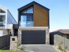 73A Penrose Drive Avondale NSW 2530 $1,200,000 A stunning custom-designed 4-bedroom family home presents here at 73a Penrose Drive, Avondale. Where luxury, comfort and contemporary style blend seamlessly to create the ultimate modern lifestyle. Move-in ready and impeccably finished, this home offers an impressive selection of premium features and beautifully crafted spaces that cater to both relaxation and entertaining. Step inside and experience palatial elegance from the very first moment. Multiple living areas provide versatility for families of all sizes, while the dedicated study ensures the perfect work-from-home set-up. The heart of the home flows effortlessly to the outdoors, where an outdoor kitchen and expansive entertaining area invite year-round gatherings with family and friends and flows seamlessly from the open plan living and kitchen area. The luxurious master bedroom suite is a true retreat, complete with a private ensuite, generous walk-in wardrobe, and an elevated balcony that captures natural light and a peaceful outlook of the escarpment. Perfect for morning coffees and afternoon relaxation. Set on a fully fenced yard, this residence offers privacy, security and the perfect space for children and pets to play and is located just minutes to Dapto CBD, freeway access, local schools, public transport and local shops. A home of this calibre offers a rare combination of luxury, practicality and modern sophistication. Perfect for families seeking style without compromise. Featuring • Modern turn-key home - move in and enjoy • 4 spacious bedrooms • Master suite with ensuite, walk-in wardrobe & private balcony • Work from home space • Multiple living areas for versatile family living • Outdoor kitchen and covered entertaining area - ideal for hosting • Custom-designed with premium finishes throughout • Fully fenced yard offering privacy and space • Minutes to Dapto CBD, local primary and High Schools and North and Southbound freeway access