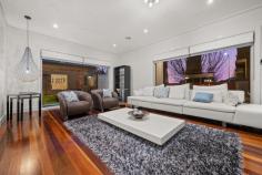 35 Ballantyne Crescent Franklin ACT 2913 Positioned in one of Franklin's most desirable pockets, this exceptional residence combines grand architectural form with refined interior detailing, offering an unrivalled lifestyle on a substantial 711 m² block. With 490 m² (approx.) of floor area, the home is designed for those seeking contemporary luxury, generous proportions and seamless family functionality. From the moment you enter, the home unfolds into a series of beautifully curated spaces-each crafted by a professional interior designer to enhance comfort, light and flow. Solid timber flooring, bespoke joinery and premium finishes create an atmosphere of understated sophistication. The ground level features three separate living zones, providing flexibility for both quiet retreats and lively gatherings. A spacious formal lounge and dining area, an open family hub, and a large rumpus room offer room for everyone. This thoughtful layout is ideal for multi-generational living, with a decent-sized bedroom on this level paired with a full bathroom, perfect for guests, extended family or those who prefer single-level convenience. At the heart of the home lies the statement kitchen-a true centrepiece of design and functionality. Appointed with 60mm granite stone benchtops, Blum soft-close cabinetry and a suite of premium Miele appliances, it integrates effortlessly with the dining and family zones. Bi-fold doors transform the space into a seamless indoor-outdoor haven, opening to a covered alfresco complete with custom joinery and a built-in BBQ-perfect for year-round entertaining. Accommodation on the upper level is equally impressive. Another four well-proportioned bedrooms provide outstanding flexibility for growing families, guests or those working from home. Bedroom two offers the perfect private retreat or media room, complete with a built-in stereo system and its own balcony. The master suite is a true sanctuary of luxury, opening to its own private terrace and featuring an oversized walk-in robe with a beautifully appointed centred island for additional storage. The spa-inspired ensuite elevates the experience even further, showcasing mosaic tiling, refined designer fixtures and a deep soaker spa bath-creating a space dedicated to relaxation and indulgence. Outdoors, the home continues to impress. The fully tiled, self-cleaning pool creates a resort-style atmosphere, surrounded by beautifully landscaped gardens that have been meticulously maintained. The entire home is presented in excellent condition-well cared for and ready for a smooth, hassle-free move-in. Perfectly positioned within walking distance to the light rail, Woolworths, parks, cafés and local conveniences-and just minutes from some of Canberra's leading private schools-this remarkable residence delivers a lifestyle of timeless elegance, comfort and superb everyday convenience. Property Highlights -Stunning architectural residence set on a generous 711 m² block, blending elegance with effortless style -Expansive approx. 490 m² floor area, thoughtfully designed for everyday comfort and effortless entertaining -Four versatile living zones thoughtfully arranged for family life, relaxing, and hosting guests -Five generous bedrooms featuring bespoke joinery and sophisticated detailing -Elegantly appointed interiors with rich timber floors and exquisite finishes throughout -Three luxurious bathrooms adorned with floor-to-ceiling tiles, granite accents, and designer vanities -Palatial master suite complete with private balcony, walk-in robe, and spa-inspired ensuite -Designer kitchen with dramatic 60mm waterfall granite island, glass splashback, and premium Blum cabinetry -Full suite of Miele appliances, including integrated dishwasher, microwave, oven, 800mm gas cooktop, and 900mm range hood -Walk-in pantry with custom joinery, feature lighting, German mixers, and double undermount sink -Seamless indoor-outdoor flow with bi-fold doors opening to alfresco entertaining -Covered alfresco with built-in BBQ, sink, custom joinery, and gas point, perfect for leisurely dining -Resort-style saltwater pool with self-cleaning system and fully tiled surrounds for a serene oasis -Beautifully landscaped gardens and freshly painted exterior, offering instant street appeal -Ducted heating and cooling with separate-zone comfort for year-round living -Double garage with internal access, high ceilings, built-in storage, and additional driveway parking for extra vehicles -Prime location: a short stroll to tram, Woolworths, parks, and Franklin shops, and moments to leading schools and town centres
