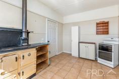 4 Mountain Avenue Batlow NSW 2730 $369,000 Positioned with an elevated aspect and boasting picturesque views, this solid home offers three bedrooms, large sun filtered living area with wood fire heating and split system air conditioning, great size kitchen and additional sunroom to the rear of the plan, all designed to capture the picturesque surrounds. You will love the space afforded in this three-bedroom brick home with low maintenance grounds on the aptly named Mountain Avenue. Do not miss your opportunity to secure such a solid home in the heart of the picturesque township of Batlow. Call or email today to book your inspection! Premiere Features: - Three bedrooms, two with ceiling fans - Bathroom with separate shower, separate bath, single vanity, wall mounted shaving cabinet and toilet - Large sun filtered lounge upon entry boasting wood fire heating, split system air conditioning and ceiling fan - Great size kitchen with slow combustion stove, electric cooktop, good bench space and cabinetry with an elevated aspect - Sunroom or dining with tiled flooring and a great view of the surrounding countryside - Mudroom area to the rear with a second separate toilet - Downstairs laundry - Front alfresco area - Single lock up garage with lighting and power - Additional woodshed - Good size fully fenced rear year with vehicle access - Approximate 841m² low maintenance allotment - Under house secure storage - Sash windows throughout