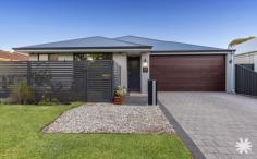 44 Newey St Rivervale WA 6103 $1,000,000 Come and be impressed by this immaculately presented, near new home built in 2021, showcasing stylish grey and black tones and offering a low maintenance lifestyle in a superb riverside location. Manicured lawns and beautifully landscaped, easy care gardens create an inviting first impression, all just a short stroll from the picturesque Swan River. Set on a 290 square metre block, this stand alone residence features a highly functional layout designed for comfortable everyday living and effortless entertaining. The open plan kitchen is a true highlight, complete with generous storage, sleek black Essastone benchtops, five burner gas cooking, a 900mm oven and dishwasher. Overlooking the living and dining area, it allows you to cook and entertain with ease, while sliding doors open to a private patio, perfect for outdoor gatherings. A separate theatre room provides a cosy space for movie nights or quiet relaxation or even transform it into a fourth bedroom.. The home offers three generous bedrooms, all with built in robes, including a master suite with a walk in robe. Two well appointed bathrooms, high ceilings throughout, reverse cycle air conditioning and a double lock up garage ensure all modern comforts are well catered for. Things to love: – Near new home built in 2021 with contemporary finishes – Open plan living with seamless indoor outdoor flow – Separate theatre room for relaxed family living – Security cameras and alarm system for peace of mind – NBN fibre to the premises – Block out blinds and tinted windows – Large ceiling fan to the master bedroom – Doggy door – Large laundry with indoor drying – Excellent storage options including attic storage with ladder access – Fully reticulated, fenced and low maintenance gardens Enjoy outstanding convenience with easy access to Optus Stadium, Crown Perth, the Swan River foreshore, East Perth and Gloucester Park. Belmont Forum, Belmont Oasis Swimming Complex, Reading Cinemas, Costco, DFO, the domestic and international airports, the CBD, Ascot and Belmont racecourses and Mineral Resource Park are all just a short drive away.