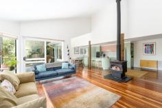 35 Domville Road Otford NSW 2508
$1,900,000 - $1,950,000 Nestled among towering gums in one of Otford's most peaceful pockets, this beautifully refreshed family retreat combines modern upgrades with flexible living. Offering a newly renovated kitchen, updates throughout, and a freestanding two-bedroom granny flat, this unique property caters to multi-generational households, investors, home-business owners, or families seeking space, privacy, and nature. Elevated above the treetops, the home captures soothing views across native bushland, with sunlit decks inviting you to relax, entertain, and take in the sounds of birdsong. With level access to the granny flat and a quiet position moments from the train, school and beaches, this truly is a rare lifestyle opportunity. YOUR HOME • The newly renovated kitchen is stylish and contemporary, featuring quality appliances, stone benchtops, and modern cabinetry, perfectly positioned next to the dining and deck areas for seamless entertaining. • Split-level design offers a versatile floorplan with four bedrooms, multiple living areas, an office, and three bathrooms. • Multi-purpose lower level featuring its own kitchen, bathroom, private entrance and deck; ideal for a teen retreat, guest accommodation, short-term rental, or home office/studio. • Enjoy the warmth of a low-emission wood burner in winter, plus reverse-cycle air conditioning for year-round comfort. • Large sun-filled verandahs and decks overlooking native trees and wildlife-a private sanctuary to unwind or host gatherings. • Double garage with private driveway entrance. • Totally independent granny flat with two-bedrooms, full kitchen, stylish bathroom, private entry and separate utilities.Perfect for long-term tenants, holiday letting, extended family, or home-based professionals. • Generous 930m² block provides privacy, space to explore and separation of granny flat from the main home. YOUR LIFESTYLE • Effortless commute with Otford Station a short walk away, with direct services to Sydney (approx. 1 hour) and Wollongong (approx. 35 minutes). • A short drive to Helensburgh for shops, cafés, restaurants, supermarkets, medical services, sporting facilities and the renowned mountain bike trail. • Otford Primary School is only a few minutes' stroll, loved for its nurturing community ethos. • Minutes to Stanwell Park Beach, Bald Hill Lookout, Werrong and Bulgo walking tracks and the Royal National Park-perfect for outdoor lovers. This is more than a home-it's a lifestyle immersed in nature, offering space, income potential, and peaceful living within easy reach of the city. Make your escape to 35 Domville Road, Otford.