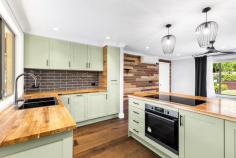 26 Hillier Avenue Blackheath NSW 2785 $750,000 - $795,000 Occupying a quiet location, this solid brick home offers an affordable opportunity to enter the popular Blackheath property market. It boasts an enviable position, being only two blocks from Govetts Leap Lookout in one direction, and within easy walking distance of the cafes and shops of Blackheath village in the other. Bathed in natural light, this home boasts a stylish kitchen renovation and new flooring, paint scheme and fresh electrics throughout. Some serious attention has also been given to the retaining walls and landscaped gardens to the fore. With two good sized bedrooms, the main with a large built-in wardrobe, well proportioned living area, a north facing sunroom and a kitchen with leafy views to the backyard, there is much to like. With a large flued gas heater and a reverse cycle a/c wall unit the house is easy to heat in winter and cool in summer. Ideal for those with busy schedules, the block is low maintenance yet equally inspiring for keen gardeners. Nature lovers will relish the proximity to the natural environment, both in the backyard and the world class bush walks available nearby. Breakdown of Features: Well proportioned, light-filled open plan living, dining and kitchen Stylish newly renovated kitchen, fresh paint scheme and new flooring Two bedrooms, main with BIWs; original bathroom, practical sep WC North facing sunroom with laundry facilities; flued gas heater; reverse a/c unit Established block 720.8m2 approx; retaining walls and garden lighting Single lock up garage; fully fenced yard ideal for children and pets Large water tank 5000L; close proximity to bush walks at Govetts Leap Convenience of local bus service nearby; easy 2km drive to village