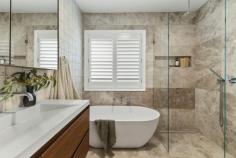 45 Forest Park Road West Blackheath NSW 2785 $1,450,000 - $1,550,000 Tucked away in one of Blackheath's peaceful and prestigious pockets, this masterfully renovated residence delivers a seamless blend of high-end craftsmanship, modern sustainability, and timeless design. Every inch of the home has been thoughtfully curated, from the hand-selected natural materials to the refined palette that harmonises with its alfresco sandstone surroundings. Expansive interiors showcase exquisite Spotted Gum timber flooring and custom Corian washplanes, while Duravit fixtures and a StoneKAST bath elevate bathrooms to a spa-like retreat. The kitchen and living zones flow effortlessly to serene outdoor spaces, framed by beautiful structurally landscaped gardens. With full insulation, premium double glazing, ducted climate control, and a powerful 13 kW solar array, this is a home that balances sophisticated comfort with cutting-edge efficiency. Designed for those who appreciate the quiet art of quality, this is Blackheath living at its most refined. Occupying a private cul-de-sac position surrounded by other salubrious properties, this generous level 1427 sqm block, is definitely one to add to your priority viewing list. Summary of Features: Open plan kitchen/living/dining with seamless connection to covered outdoor ent. High end kitchen with Calcutta Primo Quartz/u003e Quantum Quartz bench tops Walk-in butler's pantry with excellent additional storage; island bench seating Separate media room with bespoke floating cabinetry; bespoke linen/BIWs Designer Spotted Gum timber flooring by Stockmans Ridge Premium ROAK American Oak barn doors and Complete Doors Sydney Shaker doors Master with impressive built-in robes plus walk-in wardrobe; luxury shower ensuite Luxurious bathrooms with Duravit, StoneKAST and Corian fittings Atlas Concorde and Nanda designer tile selections throughout Hydrotherm heated towel rails and IXL Luminate Dual lighting/heating Elegant OLI Tap Vilo tapware and City Plus shower systems 13 kW solar system with 26 Trina Solar 500W panels and Growatt 10000TL-X inverter Fully insulated ceiling and external shell for year-round comfort Ducted electric heating and cooling system; gas hot water Safety glass windows throughout; stylish plantation shutters Double garage with internal access; Alarm system and security cameras installed Expansive level fully fenced landscaped gardens; three outdoor taps and hoses 1427sqm (approx) level block; private enclave 5 mins drive from village amenities