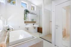 422A Tallebudgera Connection Road Tallebudgera QLD 4228 $5,000,000 It's the ultimate treechange that doesn't compromise on lifestyle or location, and it's waiting just for you in the Tallebudgera hinterland. Tucked away on 28.25 acres, yet under 15 minutes from pristine beaches, it's a paradise that unites peace, privacy and panoramic views. Gazing out across the lush valley greenery to embrace the silhouette of Burleigh Headland, it sweeps across to encompass the ocean and iconic Surfers Paradise skyline. Take a moment to linger on the expansive upper-level deck and savour this stunning outlook or make way for alfresco entertaining. Trimmed with pillarless sliding doors, it's as if the boundaries between indoors and out cease to exist. Instead, you'll benefit from a seamless connection with the light-filled, open-plan kitchen, living and dining zone, accentuated by a raked ceiling and Sydney Blue Gum timber floors. Downstairs, a spacious rumpus room with wet bar/kitchenette spills onto a terrace too, creating another fabulous entertaining zone. Alternatively, spend summers hosting friends in the pool pavilion, while staying refreshed in the supersized 10m x 3.5m saltwater pool. Enticingly, the home also caters to dual living. The main house offers three bedrooms and two bathrooms (including a light-filled master suite with ensuite) are complemented by a fully self-contained two bed, one bath guest house. Three spring-fed dams punctuate the sprawling acreage landscape, providing a permanent water supply to all paddocks. And with thriving fruit trees, a vegie patch, extensive solar and water storage, you can sample a sustainable and self-sufficient lifestyle! Steeped in pure tranquillity, it's hard to believe you can swap the green for the gold in less than 15 minutes. Local Tallebudgera eateries, shops and the popular primary school are only approx. 3 minutes by car, with Gold Coast Airport under 20 minutes from home. Swap urban chaos for a serene acreage lifestyle – arrange an inspection today. House Features: Contemporary oasis with a captivating valley, Burleigh Headland, Pacific Ocean and Surfers Paradise views Fresh, light-filled interiors enhanced with raked ceilings, polished concrete and Sydney Blue Gum timber floors Stylish kitchen with stone benchtops, breakfast bar, stainless steel sink, gas stove top Open plan living and dining with a cosy fireplace, flows seamlessly onto decking via pillarless sliding doors Lower level rumpus room includes a wet bar/kitchenette Three bedrooms with built-in robes, led by a sunlit master suite Elegant master ensuite and main bathroom. Study and powder room Two alfresco entertaining areas connected via a spiral staircase, each with sweeping views 10m x 3.5m saltwater pool and pavilion surrounded by Himalayan limestone paving Pool includes auto chlorinator, large sand filter, variable speed pump, robot cleaner and removable cover Laundry with external access Electric weather-sensor blind to the upper deck Air conditioning and ceiling fans Guest House Features: Kitchen with electric cooktop and dishwasher Combined living/dining kitchen Two bedrooms and a retreat area upstairs Bathroom Air-conditioning and ceiling fans Double garage with laundry Seating area overlooking lush acreage Adjoins a double carport Property Features: 28.25 lush, private acres Compacted road base driveway and coloured concrete turning area Automatic gate with battery back up Hikvision car number plate reader at entry gate Intercom and security cameras with remote viewing access 12kW roof top solar system, on-grid 5kw export and 100% off grid set up, 16kW solar battery, EV charger in garage Three spring fed dams, providing permanent water source to all paddocks 3 x 30,000 litre rainwater tanks to the house and 20,000L water tank to the shed Low-maintenance, engineered septic and greywater system Landscaping, raised vegie gardens, fruit trees and established gardens Chook pen and separate run Heat pump hot water units to house and guest house 100m2 shed with insulated roof Extensive steel fencing and gates Location: Approx. 3 mins to Tallebudgera State School and local shops Approx. 7 mins to St. Andrews Lutheran College Approx. 12 mins to Palm Beach Approx. 13 mins to Currumbin Beach Approx. 14 mins to Burleigh Heads Approx. 18 mins to Gold Coast Airport Approx. 34 mins to Surfers Paradise