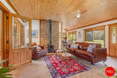 23 Strawhorn Court Kyneton VIC 3444 $950,000 - $1,045,000 If you've ever pictured yourself waking up to water views, wandering through and sipping coffee, watching kangaroos, as the morning mist lifts off the dam, this is your moment. From every room, there's a view worth framing, mesmerising outlooks that shift with the light, from rippling reflections on the water to the lush greens of the garden. You'll hardly need artwork when nature's doing the job for you. Inside, the cabin wraps you in warmth and charm. Think cove timber-lined ceilings, polished concrete floors and that wonderful mix of rustic texture and relaxed style. A crackling wood heater in the lounge sets the tone for winter nights, while split system heating and cooling keeps things perfectly comfortable year-round. The kitchen enjoys the same calming outlook, making every meal a moment to savour. The living spaces invite you to slow down, settle in and soak up the peace. Outside, it's pure magic. Expansive lawns down to the water's edge, incorporating beautiful established European shade trees and gardens that create a sense of timeless calm. Behind the dam, a pocket of bushland invites an easy afternoon wander for nature lovers or a playground for children, with the dam itself alive with yabbies and turtles, and spaces for collecting wood for the fire, family and friend gatherings, or quiet nights under the star-filled skies by the fire-pit. There's shedding with a carport, a woodshed, water tanks and solar, everything you need to live comfortably and lightly. It's relaxed, it's inviting and it's got that rare kind of charm that feels like a deep breath out. Whether it's your weekend hideaway or your forever escape, this one's all heart.
