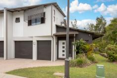 39 / 364 Gilston Road Gilston QLD 4211 $785,000 Alejandra Tinoco proudly presents this beautifully appointed townhouse located in the prestigious Grand Manors Estate, neighbouring the exclusive Grand Golf Club. Offering the perfect blend of low-maintenance living, privacy and resort-style amenities, this home is ideal for those seeking serenity without compromising on convenience. Set across two spacious levels, the property opens to a bright, airy living and dining area that flows seamlessly to a private, leafy outdoor patio-perfect for morning coffees or relaxed evenings. The well-designed kitchen offers ample storage, modern appliances and a breakfast bar overlooking the living space. Upstairs, two expansive master-style bedrooms each feature their own walk-in wardrobe and private ensuite, ensuring comfort and flexibility for couples, downsizers, small families or investors. Residents of Grand Manors enjoy manicured grounds, exceptional security and a suite of high-end facilities, all surrounded by tranquil bushland and just moments from local amenities. Features Include: • Spacious two-level townhouse in the sought-after Grand Manors estate • Secure gated community adjoining The Grand Golf Club • Two generous master bedrooms, each with walk-in wardrobes and private ensuites • Light-filled open-plan living, dining and kitchen area • Well-appointed kitchen with plenty of storage and breakfast bar • Private outdoor patio surrounded by lush greenery • Downstairs powder room • Separate laundry and excellent internal storage • Split-System air-conditioning throughout • Single lock-up garage plus additional buggy garage • Resort-style lagoon pool and lap pool with full amenities • Air-conditioned gym, tennis court and BBQ facilities • Immaculately maintained common areas and gardens • Council Rates: $2,996 pa approx. • Strata: $225 pw approx. Location Situated in the peaceful suburb of Gilston, this residence offers a unique blend of nature, lifestyle and convenience. Just minutes from: • The Grand Golf Club • Local shops, cafés and medical centres • Parks, walking trails and recreational facilities • Highly regarded schools including Gilston State School & St Brigid's • Nerang Train Station and easy access to the M1 • A short drive to Robina Town Centre and major amenities Grand Manors is known for its quiet, community-focused environment, making it one of the Gold Coast's most desirable gated estates.