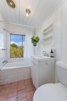 1 Wilson Street Scarborough NSW 2515 This beautifully positioned home looks out over the sparkling ocean of Scarborough Beach and has that relaxed coastal charm we all love. It's perfect as a family retreat or an investment, and can easily be divided into two separate dwellings for those looking to rent. Tucked away in a quiet street but just minutes from cafés, parks, and transport, it's a rare opportunity in a highly sought-after spot. You can breathe new life into the existing cottage or design a brand-new home to take full advantage of the sweeping views. Either way, this property offers comfort, character, and lifestyle appeal from day one, with plenty of long-term value to enjoy down the track. YOUR HOME • Enjoy sweeping coastal views that stretch all the way to Wollongong and beyond, capturing the essence of Scarborough living. • The flexible layout is divided into two dwellings, each with their own kitchen, dining, and lounge, offering options for dual living, rental income, or one spacious family home. • A large outdoor deck takes full advantage of the ocean outlook, creating the perfect setting for barbecues, entertaining, or simply unwinding after a day at the beach. • Inside, the main kitchen is neat and functional, ready for everyday use with the option to update or redesign to suit your style. • Bedrooms are well-sized and peaceful, with plenty of storage, making them ideal for families, couples, or guests. • Practical features include off-street parking, a secure garage, and extra storage for boards, bikes, and weekend gear - everything you need for a relaxed coastal lifestyle. YOUR LOCATION • Set in one of the Illawarra's most sought-after coastal suburbs, you are just a short stroll to Scarborough Beach, the Sea Cliff Bridge and the Scarborough Hotel, perfect for a morning swim, a weekend walk or sunset drinks with friends. • With Scarborough Station nearby, you are only about an hour from Sydney and 30 minutes from Wollongong, offering the best of both worlds with a relaxed coastal lifestyle and easy city access. • Local schools, bushwalks and cafés are all close at hand, making everyday living simple and enjoyable. • Homes in this tightly held pocket are rarely offered to the market and when they are, they do not last long. This is your chance to secure a coastal lifestyle with everyday convenience. Opportunities like this in such a tightly held pocket are rare, and when they do come along, they don't last long. This is your chance to secure a coastal lifestyle with everyday convenience - don't miss out!