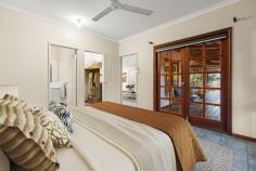 38 Kapang Drive Cable Beach WA 6726 $1,100,000 Discover a truly rare offering in one of Broome's most exclusive addresses - a super-sized 1,202m² parcel in the heart of the prestigious Sunset Rise Estate. Combining privacy, space, and an exceptional outdoor lifestyle, this property is a standout for families, entertainers, or anyone seeking tropical luxury just moments from the iconic Cable Beach. Behind its discreet street presence, a solid block wall fence and sliding gates reveal a beautifully planned and secure front yard. Enjoy expansive driveway parking, manicured lawns, and a magnificent boab tree that anchors the landscaped garden with classic Kimberley character. A separate gravel parking zone offers the perfect footprint for a large boat, caravan, or future shed, adding incredible functionality and value. Enter the home via a newly restored timber alfresco deck, complete with striking bush poles and elegant timber French doors. Inside, the home offers a practical and stylish layout featuring open-plan living and dining, fully tiled for easy care and year-round comfort. The well-appointed kitchen includes a freestanding 900mm stainless steel oven - ideal for home chefs and entertainers alike. Glass sliding doors open to a secluded rear patio, enveloped by established tropical gardens that create a private, serene outdoor retreat. Whether enjoying a morning coffee or entertaining friends, this lush corner of the home offers peace and privacy. The master suite is a generous and relaxing retreat, complete with a walk-in wardrobe and a spacious private ensuite. Two additional bedrooms are well-sized, each equipped with modern split-system air-conditioning to keep you cool throughout the Broome seasons. The central family bathroom includes a separate shower and toilet, catering comfortably for guests or children. Undoubtedly, the jewel in the crown of this property is its incredible outdoor entertaining zone. The main alfresco deck flows directly onto the resort-style pool area, constructed in 2016 and designed with tropical living in mind. The 9x4 metre fully shaded swimming pool is surrounded by exposed aggregate concrete, creating a stylish and low-maintenance space for lounging or playing. Adjacent to the pool, a show-stopping 13x4 metre custom-designed poolside pavilion delivers next-level entertaining. This striking space features polished timber decking, high-gloss timber-lined ceilings, integrated LED lighting, ceiling fans, and is fully equipped with plumbing and power, ready for a future outdoor kitchen installation. Also included is a fully appointed mandi-style bathroom, ideal for rinsing off after a swim or hosting outdoor guests in style. For the culinary enthusiast, the property also features a substantial wood-fired pizza station, complemented by a large, covered patio area - perfect for casual gatherings, family meals, or entertaining under the stars. Whether you're cooking for a crowd or relaxing poolside, this home is designed to celebrate the outdoors in true Broome fashion. This unique and meticulously maintained home captures the very essence of Broome's tropical lifestyle - blending privacy, luxury, and practicality in an unrivalled Sunset Rise location. Opportunities like this, on a block of this size, are exceptionally rare. Act quickly to secure your piece of paradise.