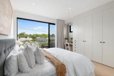 1/5 Wazir St Bardwell Valley NSW 2207 $1,800,000 - $1,900,000 Family Duplex Showcases Rare Refinement with Contemporary Style and Comfort Clever design and elegant finishes have created a family living environment of undeniable class and comfort in this sleek, as-new duplex. Making an instant impression from the street, the striking two-tone brick facade is accented with hanging greenery and landscaped gardens. Stepping inside, the effortless sense of style continues with timber flooring, tall ceilings and sleek on-trend appointments, while the prime north west to rear aspect ensures superb natural lighting throughout. There are up to five bedrooms to cater for growing families, with a gourmet gas kitchen and multiple alfresco settings adding immense appeal for entertainers. Quietly positioned but still close to everything you could need, this magnificent home is just 250 metres from Athelstane Public School and 400 metres from Arncliffe Park and playground. There's also easy walking access to two different train lines - a 900 metre stroll will take you to Turrella Station, and Arncliffe's main street shopping strip and station are both 1.1 kilometres away. • Engineered timber floors and high shadowline ceilings • Modern design fuses living, dining and kitchen spaces • Tall sliding glass doors ensure seamless flow to terrace • Barbecue kitchenette for easy all-weather entertaining • Sunny level lawn leads to raised carport/alfresco setting • Sophisticated stone island kitchen features gas cooktop • Four upper bedrooms with robes, ground floor fifth/study • Main has dual rain shower ensuite, desk, private balcony • Balcony captures elevated outlooks over neighbourhood • Refined family bathrooms on both floors, one with bath • Ducted a/c, abundance of storage including under stairs • Rear lane access to secure paved carport from Gipps St • Carport offers great versatility as extra entertaining area • 500m to Wollongong Rd village, 1km to Forest Rd shops • 1.1km to waterside parklands and trails along Wolli Creek • 2km to Wolli Creek's dining precinct, station, Woolworths