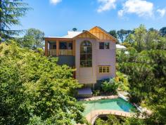 26 Prince George Street Blackheath NSW 2785 $1,350,000 - $1,450,000 Occupying a generous and peaceful position in one of Blackheath's most cherished streets, this expansive and character-filled home delivers warmth, flexibility and timeless mountain charm. Rich in original detail and thoughtfully enhanced for modern living, the residence offers an adaptable floor plan ideal for families, intergenerational living or those who love to host with ease. Beautifully maintained timber floorboards, soaring lined-board ceilings, large architraves, wainscoting, architectural fanlights, and stained-glass windows create an immediate sense of heritage elegance. Two fully functional fireplaces anchor the living spaces, while multiple living zones allow for both quiet retreat and lively gatherings. The kitchen is a true heart-of-the-home space, appointed with granite bench tops, induction cooktop and an original working Rayburn wood stove. A separate dining room enhances functionality, while two charming bathrooms with tessellated tiles and baths reinforce the home's classic appeal. Indoor comfort is assured year-round with electric zoned ducted heating and cooling, supported by an exceptional solar system with battery storage. Outdoors, a heated saltwater pool and multiple decks extend the living experience, overlooking a cool-climate cottage garden that embraces the seasons. With irrigated garden beds for ferns, rhododendrons, camellias, azaleas, magnolia, pear and chestnut trees, roses, dahlias, lilies, vegetable and herbs, this property offers a rare sense of tranquillity, productivity and connection to nature. Thoughtful infrastructure, storage and sustainability features complete a home that is both practical and deeply inviting. This is a residence that effortlessly balances space, character and modern efficiency, offering a refined yet relaxed mountain lifestyle 700m walk to Blackheath village. Key Features: Two separate living spaces and two outdoor decks for entertaining Fully electric home with 3-phase power Impressive solar system with a 9.6 kWh battery and two heat pumps servicing the house and a heated saltwater swimming pool Zoned ducted heating and cooling Double built-in robes in two bedrooms Sunroom with glass ceiling Under-house workshop and storage, and under-stair storage Three rainwater tanks (approx. 200 gallons each) Greenhouse and private courtyard Irrigated, zoned cool-climate gardens embracing seasonal planting Single garage and additional parking space