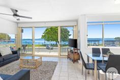 1 / 20 Kurrawa Close Nelson Bay NSW 2315 Perfectly positioned on the waterfront with uninterrupted vistas across the pristine waters of Little Beach, this exceptional apartment presents a rare opportunity to secure a highly desirable coastal address. Offering a front row seat to the bay and leafy foreshore reserve directly opposite, this residence delivers a lifestyle defined by relaxation, convenience, and natural beauty. Expansive floor to ceiling windows frame the sparkling water outlook, bathing the open plan living and dining spaces in natural light and seamlessly connecting the indoors with the picturesque coastal setting. A generous balcony provides an idyllic vantage point for alfresco dining, quiet morning coffees, or simply appreciating the ever changing water views and passing marine activity. Well appointed and immaculately maintained, the apartment features a functional kitchen, two comfortable bedrooms, and a central bathroom, complemented by secure parking and well kept communal grounds. Offering low maintenance living in a boutique building, this residence is ideal as a permanent home, holiday retreat, or premium investment opportunity in one of Nelson Bay's most tightly held beachfront pockets. Featuring: - Absolute waterfront position with panoramic water views - Light-filled open plan living and dining with floor to ceiling glass - Spacious covered balcony capturing the bay and foreshore outlook - Two generous bedrooms and a central bathroom - 2 car parks and well maintained common areas - Footsteps to Little Beach, picnic areas, and foreshore walking trails - Easy stroll to Nelson Bay Marina, cafés, restaurants, and retail precinct Location: - Approx. 50m walk to Little Beach - Approx. 400m walk to Shoal Bay Beach - Approx. 2 minute drive to Nelson Bay CBD