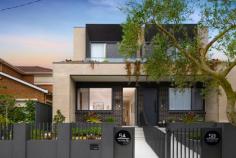 1/5 Wazir St Bardwell Valley NSW 2207 $1,800,000 - $1,900,000 Family Duplex Showcases Rare Refinement with Contemporary Style and Comfort Clever design and elegant finishes have created a family living environment of undeniable class and comfort in this sleek, as-new duplex. Making an instant impression from the street, the striking two-tone brick facade is accented with hanging greenery and landscaped gardens. Stepping inside, the effortless sense of style continues with timber flooring, tall ceilings and sleek on-trend appointments, while the prime north west to rear aspect ensures superb natural lighting throughout. There are up to five bedrooms to cater for growing families, with a gourmet gas kitchen and multiple alfresco settings adding immense appeal for entertainers. Quietly positioned but still close to everything you could need, this magnificent home is just 250 metres from Athelstane Public School and 400 metres from Arncliffe Park and playground. There's also easy walking access to two different train lines - a 900 metre stroll will take you to Turrella Station, and Arncliffe's main street shopping strip and station are both 1.1 kilometres away. • Engineered timber floors and high shadowline ceilings • Modern design fuses living, dining and kitchen spaces • Tall sliding glass doors ensure seamless flow to terrace • Barbecue kitchenette for easy all-weather entertaining • Sunny level lawn leads to raised carport/alfresco setting • Sophisticated stone island kitchen features gas cooktop • Four upper bedrooms with robes, ground floor fifth/study • Main has dual rain shower ensuite, desk, private balcony • Balcony captures elevated outlooks over neighbourhood • Refined family bathrooms on both floors, one with bath • Ducted a/c, abundance of storage including under stairs • Rear lane access to secure paved carport from Gipps St • Carport offers great versatility as extra entertaining area • 500m to Wollongong Rd village, 1km to Forest Rd shops • 1.1km to waterside parklands and trails along Wolli Creek • 2km to Wolli Creek's dining precinct, station, Woolworths