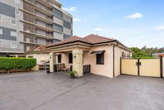 5 Church Road Yagoona NSW 2199 Positioned in the very heart of Yagoona's thriving shopping strip, this commanding corner block property presents an outstanding opportunity for owner-occupiers, professionals, investors, and future developers alike. Zoned for high-density development, this versatile full-brick residence is ideal for those seeking a live-and-work setup, a strong rental return, or the potential to hold, collect income, and develop later, with the added upside of possible land amalgamation (STCA). Ideal for Medical & Professional Use. Currently configured for both residential and commercial use, the property is perfectly suited for dentists, doctors, allied health professionals, beauty operators, or other service-based businesses, thanks to the massive council car park located directly at the rear, providing exceptional convenience for clients and staff. Flexible & Functional Layout. The property is cleverly divided into three separate sections, offering flexibility and multiple income streams: Front residence: three spacious bedrooms, one bathroom - Ideal for comfortable family living or professional accommodation Self-contained studio (attached): Perfect for extended family, rental income, or staff use Rear commercial space: Currently operating as a two-room beauty salon. Separate side access - Ideal for medical, consulting, or retail-style use Property Features: Full brick construction Four bedrooms, two bathrooms, three toilets total Corner block with excellent street exposure Rear council car park - a rare and valuable asset High-density zoning with strong future upside Unbeatable Location: Situated within walking distance to shops, cafés, transport, and essential amenities, this is a tightly held and fast-growing part of Yagoona that continues to attract both business owners and developers. A rare opportunity to secure a flexible, income-producing property with serious future potential in a prime location.