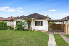 15 Elizabeth Crescent Yagoona NSW 2199 $1,399,950 Set in a peaceful and family-friendly crescent, 15 Elizabeth Crescent presents an outstanding land opportunity in a highly convenient Yagoona location. Positioned on a generous 619.7 square metre parcel with a 13.4 metre frontage, this property offers a rare blank canvas for buyers looking to build, develop or renovate, subject to council approval. The existing home is an original two-bedroom residence with a separate living area that could easily be converted into a third bedroom. There is an original kitchen and dining area, a separate bathroom, and a laundry at the rear. There is also a carport with driveway access to the rear. The home has been cleaned and cleared, offering a straightforward starting point for renovation or future plans. The spacious block lends itself well to a new home, a granny flat addition, or a complete knockdown and rebuild project, subject to council approval. Located moments from Yagoona Station, local shops, Bankstown CBD, and Condell Park cafes, schools and amenities, this is an ideal opportunity for builders, investors or families looking to secure land in a tightly held pocket. An excellent land value proposition in a convenient and growing location.
