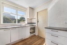 2/72 High Street Frankston VIC 3199 $410,000 - $450,000 Welcome to a character-filled two-bedroom unit offering the perfect blend of comfort, style and convenience in a central Frankston location. Set across from a peaceful park and just minutes to the beach, Frankston Hospital, Bayside Shopping Centre and local schools, this is an exceptional opportunity to secure a move-in ready home with everyday ease. Step inside to find floating timber-look flooring that flows through the open-plan living and dining space, enhanced by beautiful timber feature walls that bring a cosy warmth to the interior. The open kitchen is well-appointed with sleek cabinetry, tiled splash-back, and quality Ariston gas cooktop and oven, perfect for home cooking or entertaining with friends. Both bedrooms are well-proportioned and fitted with built-in robes, while the bathroom/laundry combination is practical and neat, with thoughtful design for efficient living. The home also includes soft carpeting in bedrooms for added comfort, a bright north-facing window aspect, and off-street parking. Enjoy a low-maintenance lifestyle with every essential right at your fingertips, all within a boutique block of only a few residences. Whether you're looking for a smart investment or your first step into the market, this one ticks all the boxes for comfort and convenience in an unbeatable location.