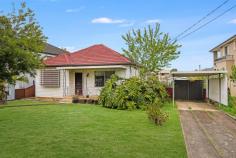 37 Shackel Avenue Guildford NSW 2161 $1,699,950 Offered for the first time in many years, presents a rare opportunity on a generous 727m2 parcel with a wide 18m frontage - ideal for those looking to knock down and build a family home, invest and add a granny flat or explore your development options (STCA). Set in a quiet yet central location, this original three-bedroom home offers a neat kitchen and bathroom, separate living and dining areas and ample car accommodation, carport and driveway access to the rear single lock-up garage. Whether you're planning to knock down and rebuild your dream family home with a pool and granny flat, or renovate and add value with a secondary dwelling, this is a blank canvas in a prime location. Features Include: Large 727m2 block with 18m frontage Development potential (STCA) Two-bedroom home with original interiors Original kitchen and bathroom Carport and driveway access to the rear Open alfresco/deck area Large backyard with a grass area perfect for kids and families Perfectly positioned in close to Guildford shops, local schools, places of worship, train stations and the ever-growing Parramatta CBD. Guildford train station - 500m Rahma Mosque Guildford - 650m Guildford Shops - 850m Woodville Gold Club - 1.2km Guildford Public School - 1.3km Chester Hill High School - 2.4km Our Lady of the Rosary -2.8km