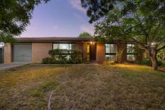 8 Mellor Circuit Florey ACT 2615 Offered to the market for the first time is this lowset brick and tile classic, circa 1980's, on an 841m2 block with a huge level fully fenced backyard, in a quiet, loop street in well-located Florey just minutes to Belconnen, Lake Ginninderra and the university, plus walking distance to local parks, schools, and transport. Across a single level the home comprises three bedrooms, original bathroom and kitchen (both in immaculate condition), formal lounge, dining, full length open-air rear patio with a prized north-easterly aspect, separate laundry with external access, and single lock up garage. The home has been well maintained and is in ultra comfortable and liveable condition 'as is' with plenty retro-charm from its era including curved arches and offers lashings of potential to renovate and reimagine for the buyer looking to invest in future reward in terms of both capital gain and overall appeal. Existing features include built-in robes in two of the bedrooms, separate shower and bathtub, carpeted flooring in good condition, room for a dishwasher in kitchen, and space on driveway for parking additional vehicles. The bones are good, the warmth is palpable, and the opportunity is exciting! The north-east facing backyard is a blank canvas for a variety of scenarios including creation of a fabulous alfresco entertaining zone complete with pool and/or spa, erection of a shed (big or small), create a colourful boutique garden with walkways and a gazebo, or just leave as is, as it provides masses of space for children and pets to play outdoors - more sunshine, less screentime! This is a property that will appeal to a variety of potential purchasers, from first home buyers, investors, builders/tradies, through to renovation enthusiasts seeking a property flipping opportunity in a great neighbourhood offering exceptional convenience. So close to the lake including boat ramp and dog park, plus quality education facilities; you can embrace a family-friendly lifestyle with ease, the essentials and the fun stuff is quick and easy to access. No wonder the original owners held on to it so tightly! Be the first to act or you face the very real possibility of missing out! Renovate, reimagine, and reap rewards. Classic lowset brick & tile on 841m2 with huge level backyard Lashings of potential to renovate/reimage & reap rewards Infused with retro-charm & warmth, mostly original condition Fully fenced north-east facing pet and child-friendly backyard Quiet loop street just a short walk to parks, schools & shops Just minutes to Lake Ginninderra for boating, picnics & BBQs Short drive to universities, hospital, Belconnen & 18 mins to CBD First time to market, tightly held by original owners since built Renovators, investors & first home buyers should act ASAP!