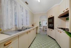 8 Mellor Circuit Florey ACT 2615 Offered to the market for the first time is this lowset brick and tile classic, circa 1980's, on an 841m2 block with a huge level fully fenced backyard, in a quiet, loop street in well-located Florey just minutes to Belconnen, Lake Ginninderra and the university, plus walking distance to local parks, schools, and transport. Across a single level the home comprises three bedrooms, original bathroom and kitchen (both in immaculate condition), formal lounge, dining, full length open-air rear patio with a prized north-easterly aspect, separate laundry with external access, and single lock up garage. The home has been well maintained and is in ultra comfortable and liveable condition 'as is' with plenty retro-charm from its era including curved arches and offers lashings of potential to renovate and reimagine for the buyer looking to invest in future reward in terms of both capital gain and overall appeal. Existing features include built-in robes in two of the bedrooms, separate shower and bathtub, carpeted flooring in good condition, room for a dishwasher in kitchen, and space on driveway for parking additional vehicles. The bones are good, the warmth is palpable, and the opportunity is exciting! The north-east facing backyard is a blank canvas for a variety of scenarios including creation of a fabulous alfresco entertaining zone complete with pool and/or spa, erection of a shed (big or small), create a colourful boutique garden with walkways and a gazebo, or just leave as is, as it provides masses of space for children and pets to play outdoors - more sunshine, less screentime! This is a property that will appeal to a variety of potential purchasers, from first home buyers, investors, builders/tradies, through to renovation enthusiasts seeking a property flipping opportunity in a great neighbourhood offering exceptional convenience. So close to the lake including boat ramp and dog park, plus quality education facilities; you can embrace a family-friendly lifestyle with ease, the essentials and the fun stuff is quick and easy to access. No wonder the original owners held on to it so tightly! Be the first to act or you face the very real possibility of missing out! Renovate, reimagine, and reap rewards. Classic lowset brick & tile on 841m2 with huge level backyard Lashings of potential to renovate/reimage & reap rewards Infused with retro-charm & warmth, mostly original condition Fully fenced north-east facing pet and child-friendly backyard Quiet loop street just a short walk to parks, schools & shops Just minutes to Lake Ginninderra for boating, picnics & BBQs Short drive to universities, hospital, Belconnen & 18 mins to CBD First time to market, tightly held by original owners since built Renovators, investors & first home buyers should act ASAP!