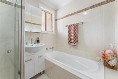 4/5-7 Short Street Helensburgh NSW 2508 Positioned in the very heart of Helensburgh, this stunning three bedroom townhouse offers the ideal blend of space, comfort and convenience. Designed with modern living in mind, the home features light filled open plan interiors, a sleek contemporary kitchen, family bathroom, ensuite, ducted air conditioning throughout and multiple outdoor spaces-making it the perfect place to call home. The expansive open plan living and dining area creates a welcoming atmosphere ideal for both entertaining and everyday living. Glass doors seamlessly connect the indoors to private alfresco courtyards at the front and rear, while a grassy side yard provides a wonderful space for children or pets to play. At the heart of the home, the modern kitchen is equipped with stainless steel appliances, stylish benchtops and generous storage, ensuring both functionality and style for the home cook. Upstairs, the townhouse offers three generous bedrooms, each with built in wardrobes. The master bedroom enjoys the added luxury of a private ensuite, while the remaining bedrooms are serviced by a well appointed family bathroom-providing comfort and privacy for the whole household. Step out onto the balconies to enjoy peaceful town views, whether it's your morning coffee or a relaxing evening drink. Additional features include a remote-controlled garage, an extra car space to the rear, and a convenient garden shed. With shops, cafés, restaurants and local amenities just moments from your door, this central location delivers an exceptional lifestyle of ease and convenience.