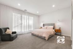 50 Tynong Rd Tynong VIC 3813 $1,250,000 - $1,350,000 Modern Masterpiece on 1,800sqm Immersed in tranquility and embraced by picturesque countryside, this architecturally designed residence delivers a striking statement of modern country living. Dark exterior finishes and bold pitched rooflines are beautifully balanced by warm timber accents and the vibrant greens of the surrounding gardens and established trees. A distinct wing flows effortlessly from the main pavilion, where soaring vaulted ceilings, refined timber flooring, and polished timber details create an impressive yet inviting central hub. The expansive open plan living, dining, and kitchen zone; complete with a butler’s pantry forms the ultimate entertaining space, seamlessly connecting to a second lounge that offers a more intimate retreat. Designed with family living in mind, the private accommodation wing comprises three generously sized bedrooms, including a luxurious main suite featuring a walk-in wardrobe and stylish ensuite. A beautifully appointed main bathroom and separate powder room service the remaining bedrooms with ease. Outdoors, the home truly shines. Covered alfresco living captures golden afternoon sunlight while overlooking the immaculate rear yard, highlighted by a built-in entertaining area and firepit; perfect for year-round gatherings. Offering the latest in thermal efficiency technology and complemented by the home's passive orientation, ensuring year-round comfort. Matched with zoned refrigerated climate control, heat pump hot water and 10.6kw solar array. Completing the offering is an oversized double garage with workshop and an extensive hardstand, delivering exceptional practicality. Your dream lifestyle awaits. Experience the very best of modern country living at 50 Tynong Road.