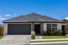 89 Sunbird Drive Redbank Plains QLD 4301 $939,000 BUILT IN 2022, OWNER OCCUPIED AND ONLY ONE OWNER! Built in 2022 by Coral Homes, this beautifully presented residence showcases exceptional finishes throughout and a thoughtfully designed layout tailored to modern family living. The kitchen forms the heart of the home, featuring generous proportions, quality cabinetry, ample bench space and a walk-in pantry, all seamlessly connecting to the open-plan dining and family zone. This central space flows effortlessly to the covered outdoor area, creating a welcoming environment for everyday living and entertaining. Offering flexibility rarely found, the home includes three separate living areas comprising a media room, activity space and open-plan living. The bathrooms are finished in a timeless, contemporary style with neutral tones, quality fixtures and practical layouts that balance style and functionality. Positioned within a quiet, family-oriented neighbourhood and conveniently located close to schools, childcare centres, shopping and a newly introduced bus service running past the home, this property presents an outstanding opportunity for families, owner-occupiers and investors alike. Key Features: Spacious master bedroom complete with walk-in robe and private ensuite Three additional well-sized bedrooms, each fitted with built-in robes Large kitchen with ample bench space, quality cabinetry, gas cooktop and walk-in pantry Open-plan family and dining area connecting seamlessly to the outdoor entertaining space Separate media room ideal for movie nights or quiet retreat Versatile activity area perfect for children's playroom or home office Stylish main bathroom with bath, shower and modern finishes Covered outdoor living area overlooking a low-maintenance backyard Double remote garage with internal access Built in 2022 by Coral Homes with exceptional finishes throughout Quiet, family-friendly neighbourhood with a bus service running past the home Conveniently located close to schools and childcare centres Approximately 7 minutes to Redbank Town Square Approximately 10 minutes to Orion Shopping Centre DON'T MISS OUT ON THIS ONE, IT IS A UNIQUE AND AMAZING OPPORTUNITY TO OWN A EXECUTIVE FAMILY RESIDENCE IN AN EVER GROWING SUBURB!