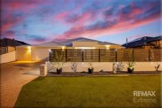 29 Seaspray Cres Jindalee WA 6036 $1,299,000 This big, bold, and beautiful home is nestled in one of Jindalee's most sought-after pockets and offers space and style in abundance! Larger than life, this 5-bedroom 'Scott Park' home was designed and constructed to meet the needs of a growing family lifestyle! When it comes to outdoor entertaining, this one has it all…a stylish alfresco, huge sparkling pool, BBQ area and all within a stone's throw from the tranquil blue waters of the Indian Ocean! Without a doubt, this is the ULTIMATE FAMILY PACKAGE so don't delay…Call now and submit your offer today! Standing proud on a secure 660sqm block with a huge 20-meter frontage, this top of the range property is perfectly positioned on a quiet street, surrounded by quality homes & friendly neighbours. In close proximately to beautiful parks, restaurants, shops - you are only a short walk to local schools, and less than a kilometre to Jindalee beach, where you can grab a cold drink, take in breathtaking sunsets and enjoy the cool coastal breeze. Set back from the roadside, the front elevation is bold and imposing and looks out to a low-maintenance front garden meaning all the work is done! Completely enclosed to allow full use of the block, the front elevation is instantly appealing to the eye and features a grand portico, double front entry and ambient lighting. When it comes to parking vehicles, this home will cater for the whole family thanks to the double garage, extended driveway and additional space at the front! Whether it be, boats, caravans or work trailers you will not be disappointed here! If you like to tinker with tools or simply need extra storage, be sure not to miss the custom built “man cave” which adds as an extension to the garage, giving you the perfect little workshop to get creative in! From the moment you step through the grand double entry, you're welcomed by an impressive foyer that immediately sets the tone for the home's elegance. Wide hallways, soaring high ceilings, stunning Malaysian Jarrah flooring and quality finishes combine to create a striking first impression of refined luxury. Designed with both sophistication and comfort in mind, the residence reveals a beautifully considered floorplan, showcasing exceptional craftsmanship and a wealth of thoughtful design elements, delivering a home that feels equally stylish as it does warm and inviting. Nicely secluded, the king sized master bedroom offers a serene retreat, complete with a spacious walk in robe, wooden flooring, and peaceful garden views. The adjoining ensuite includes modern touches with an oversized hobless shower, dual vanities, and an abundance of cupboards and bench space. A nearby nursery (bedroom 2) adds convenience, while the remaining bedrooms are positioned in their own private wing of the house. Each is generously sized and fitted with built in or walk in robes, soft neutral tones, and quality flooring. The family bathroom echoes the master ensuite with contemporary upgrades and full height tiling. Central to all the action, the deluxe kitchen is designed to be both a functional workspace and a stunning focal point for entertaining. Thoughtfully appointed with an abundance of storage, it ensures every utensil, appliance and ingredient has its place, maintaining a seamless and clutter-free environment. The sleek 'Essa' stone benchtops offer generous preparation space while adding an elegant, contemporary touch. Additional highlights include stainless steel appliances with rangehood, dishwasher, a built-in pantry, microwave recess and a double fridge recess - creating a kitchen that effortlessly balances practicality with sophisticated style, and provides the perfect setting to cook, entertain and create lasting memories. One of the true selling points to this amazing home has to be the unique layout! Framed by crisp white plantation shutters, the bright & airy open plan living & dining area is drenched in natural light and is the hub of the home's natural energy! With custom built cabinetry, skirting boards, freshly polished timber floors and a fresh coat of paint throughout, this generous living quarter is designed for effortless entertaining and memorable family gatherings, from birthday celebrations to festive holidays! When it's time to unwind, the sunken theatre room delivers an immersive experience. Finished in rich, moody tones with brand new plush carpet, it offers the perfect escape for movie nights and a haven for teens to watch their favourite movies! A dedicated study sits at the centre of the home, providing an ideal workspace or “quiet zone” for homework & assignments. Its generous proportions also make it perfect as an additional media room or gaming retreat! Outdoors, the property continues to impress. The huge wrap around vaulted patio is designed for year round enjoyment, enhanced by café blinds for all season comfort, this versatile space caters to every member of the household. From the AFL Derby to the Rugby World Cup, Melbourne Cup and Champions League Final, this exceptional undercover entertaining zone is purpose-built for unforgettable moments and truly comes to life on warm summer evenings - delivering the perfect backdrop for milestone celebrations, movie nights, major sporting events and relaxed family gatherings alike. The sparkling pool, framed by limestone paving, forms the centrepiece of the backyard, a spacious sanctuary complete with a soothing water fountain - heated for extended seasonal use. With captivating features at every turn, this exceptional property offers a rare blend of serenity, style, and superior liveability, an outstanding choice for families who love to entertain and appreciate quality in every detail. Extras Include: Double remote garage + enclosed storage area, side access, huge fitted laundry + linen, solar panels, ducted reverse cycle air-con, alarm system, security door, ceiling fans, LED lighting, additional TV + power points, 3x TV brackets, built-in cabinetry + shelving, 8x security cameras + audio, double glazing to back windows, tinted front windows, outdoor weatherproof café blinds, pool equipment, clothesline, retractable hosepipe, and so much more!