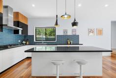 10 Loddon Street Kaleen ACT 2617 Set in a quiet, family-friendly street, 10 Loddon Street, Kaleen is a beautifully renovated four-bedroom home designed for effortless everyday living and relaxed entertaining. Showcasing a practical family floorplan, the home blends modern updates with timeless comfort, featuring hardwood timber floors throughout, a welcoming gas fireplace in the dining room, and a seamless connection to the outdoor entertaining deck. The renovated kitchen sits at the heart of the home, offering a gas cooktop, generous bench space and a walk-in pantry with appliance shelf-perfect for busy households and keen entertainers alike. Both bathrooms have been stylishly updated, bedrooms are spacious and well-appointed, and the landscaped, low-maintenance gardens complete a home that's ready to enjoy from day one. With excellent access to schools, shops, green spaces and Canberra CBD, this is an outstanding opportunity in a tightly held Kaleen pocket. ? Segregated master suite with walk in robe & ensuite ? Three additional bedrooms with built in robes ? Renovated kitchen with gas cooktop, ample bench space and walk-in pantry ? Hardwood timber floors throughout ? Gas fireplace in dining room ? Dining room opening onto rear entertaining deck ? Renovated main bathroom and ensuite ? Spacious bedrooms with roller blinds ? Ducted reverse cycle air conditioning ? Double carport with automatic roller door plus single garage to rear ? Landscaped, low-maintenance gardens ? Quiet street location ? 10-minute walk to local IGA and coffee shop ? 12-minute walk to local primary school ? 15-minute drive to Canberra CBD ? Close to Kaleen Plaza, UC Bruce campus, AIS, North Canberra Hospital, Belconnen Town Centre, walking trails and reserve areas