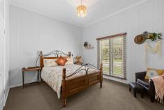 387 Derreen Rd Murrays Bridge QLD 4370 $785,000 Beautifully restored, this charming cottage is the original Wildash State School which was built in 1882 and moved to it's present location on Derreen Rd. Sitting on a lovely 5 acre parcel, enjoy the serenity & rural outlook that this property offers! Features include - 3 bedrooms or 2 plus an office 11 ft ceilings with exposed beams & stained glass features Walk in robe in main bedroom Cosy lounge room with wood heater Reverse cycle air-conditioning Lovely kitchen with gas stove & electric oven Renovated bathroom with large walk in shower Separate toilet Practical laundry Back deck overlooking the property Fully fenced house yard 2 x 5,000 gallon rainwater tanks plus a dam NEW 8 x 7m colorbond shed NEW roof & the house has been relevelled in the last 12 mths Septic system has been replaced Chook pen, round yard & 40 ft shipping container included with the sale Convenient 10-15 minute drive from Warwick