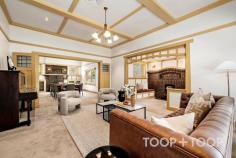 4 South Terrace Kensington Gardens SA 5068 $4,400,000 - $4,600,000 Built c.1930 and cherished by the same family for over 32 years, this landmark residence unfolds across a magnificent 1,677sqm parcel in one of Adelaide’s most tightly held enclaves. Blending timeless character with modern comfort, it offers exceptional scale, multiple living zones and a resort-style rear garden with swimming pool and guest retreat. Opposite the green expanse of Kensington Gardens Reserve, this is an extremely rare opportunity to secure an elegant family estate in a truly coveted setting. Set beyond a broad, tree-lined frontage, the home makes an immediate impression with its grand, traditional verandah perfect for your morning coffee whilst enjoying the leafy outlook across the park. Inside, a wide entrance hall establishes the home’s grandeur, leading directly to the front living spaces. Timber floors, soaring 3m ceilings and original fireplaces speak to the residence’s character, while a thoughtful floorplan ensures effortless flow between formal and informal zones. Grand in scale yet warm in ambience, the formal dining and living rooms are framed by park-facing sash windows and graced with two working fireplaces, including a charming Inglenook. The atmosphere is one of quiet elegance, ideal for refined entertaining or simply retreating with family at day’s end. At the heart of the home, the open-plan kitchen, dining and living domain celebrates light, volume and connection. Exposed timber beams, a feature fireplace and a skylight create a space both welcoming and striking. The gourmet kitchen, appointed with dual AEG ovens, gas cooktop, Miele dishwasher and a large walk-in pantry, is designed for both everyday ease and entertaining. Sliding glass doors allow for seamless integration with the outdoor terrace, pool and landscaped gardens. The master suite is a serene retreat, complete with walk-in robe, additional built-in robes, ensuite with double vanity, bath, shower and luxurious underfloor heating. Dual access to the hallway enhances practicality, all whilst being framed by leafy park vistas. Four further bedrooms, each with built-in robes and one with a built-in desk, provide generous family accommodation. Fully renovated family bathrooms, complete with heated towel rails, enhance everyday comfort. Manicured lawns and established gardens frame a lifestyle of outdoor enjoyment. The 12.5m solar-heated saltwater pool takes centre stage, complemented by a pool/guest house with a kitchenette and French doors opening to a private courtyard, a great space for casual entertaining. The expansive rear lawn offers impressive scope for a tennis court (STCC), while also providing a setting designed for both relaxation and entertaining. Positioned on a prestigious tree-lined street, the home enjoys a commanding presence directly opposite Kensington Gardens Reserve, where tennis courts, cricket nets, playgrounds and BBQ facilities enrich family life. Enjoy the convenience of walking to Erindale Shopping Centre, with Burnside Village, The Parade Norwood dining precinct, and the CBD all just minutes away. AN EXTENSIVE LIST OF FEATURES INCLUDE: PARKING Double carport Multiple off-street options KITCHEN Dual AEG ovens Gas cooktop Miele dishwasher Walk-in pantry Skylight Abundant storage ELEVATIONS Polished timber floorboards Multiple fireplaces incl. Jetmaster Exposed timber beams High ceilings (3m+) Curtains + roller blinds Character sash windows COMFORT Ducted reverse-cycle air conditioning (zoned) Gas hot water system Heated towel rails & underfloor heating (master) SECURITY Monitored alarm system Intercom system throughout TECHNOLOGY NBN connection POOL 12.5m in length, 1m-1.8m-1.5m in depth Solar-heated, salt chlorinated Fully fenced Concealed pool pump Pool cover GUEST/POOL HOUSE Kitchenette & French doors Instant electric hot water Courtyard entertaining GARDEN Professionally landscaped with irrigation Expansive lawns, fruit trees & vegetable plot Potential to install full-size tennis court (STNCC) Powered tool shed STORAGE Built-in cabinetry WIR in master, BIR in bedrooms 2-4 Independent laundry (recently upgraded) Linen closet Under-stair wine storage POSITION Premium tree-lined street Opposite Kensington Park Reserve Minutes to Burnside Village & The Parade Walk to Erindale Shopping Centre SCHOOLS Zoned to Burnside PS, Magill PS & Norwood International HS Close to Pembroke & St Peters Girls Nearby Loreto, Rostrevor & Marryatville